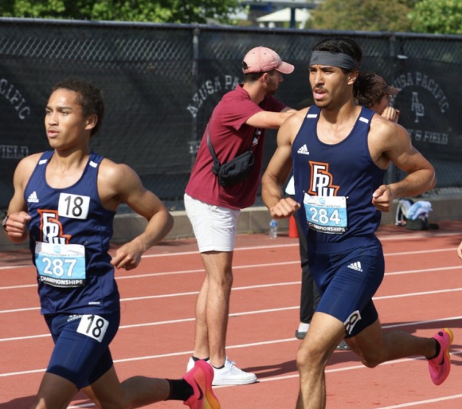 Jacob Resendez competing on the track for Fresno Pacific
